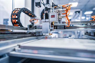 Image showing CNC Laser cutting of metal, modern industrial technology.