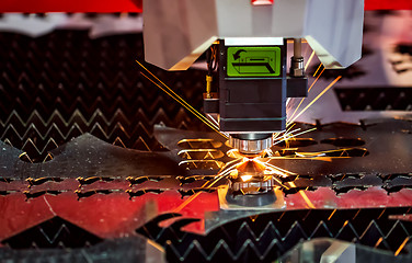 Image showing CNC Laser cutting of metal, modern industrial technology.