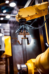 Image showing Robotic Arm modern industrial technology. Automated production c