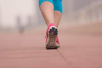 Image showing woman running on the promenade