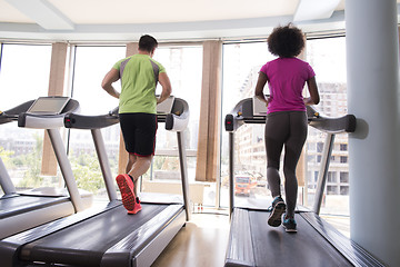 Image showing people exercisinng a cardio on treadmill in gym