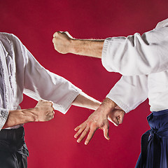 Image showing Two men fighting at Aikido training in martial arts school