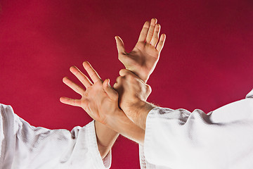 Image showing Two men fighting at Aikido training in martial arts school