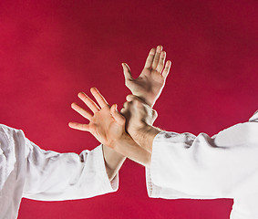 Image showing Two men fighting at Aikido training in martial arts school