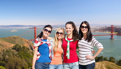 Image showing happy young women over golden gate bridge