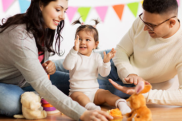 Image showing baby girl with parents clapping hands