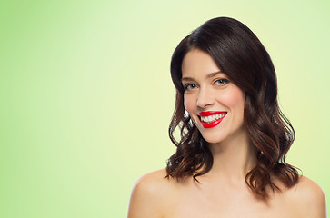 Image showing beautiful smiling young woman with red lipstick