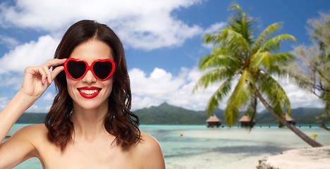 Image showing woman with sunglasses over tropical beach