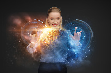 Image showing businesswoman with virtual space hologram