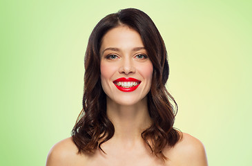 Image showing beautiful smiling young woman with red lipstick