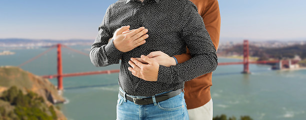 Image showing close up of hugging gay couple in san francisco