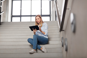 Image showing woman or student with tablet pc sitting on stairs