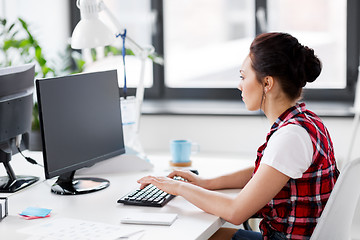 Image showing creative woman with computer working at office