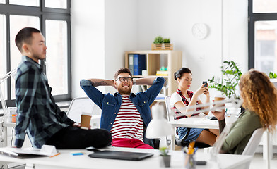 Image showing creative team drinking coffee at office