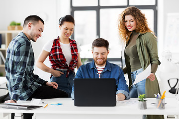 Image showing creative team with laptop working at office