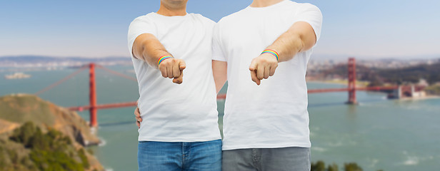 Image showing couple with gay pride rainbow wristbands