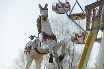Image showing carousel horse in an amusement park 