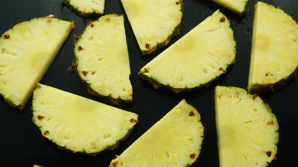 Image showing Half cut pineapple pieces 