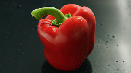 Image showing Red pepper with drops on surface