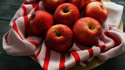 Image showing Fresh apples on striped towel 