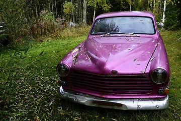 Image showing abandoned crimson old car