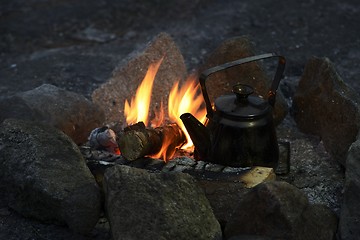 Image showing tourist kettle on the campfire