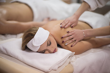 Image showing couple receiving a back massage