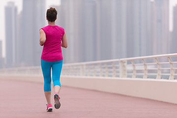 Image showing woman running on the promenade