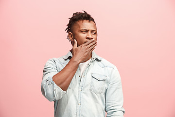 Image showing Young serious thoughtful Afro-American businessman. Doubt concept.