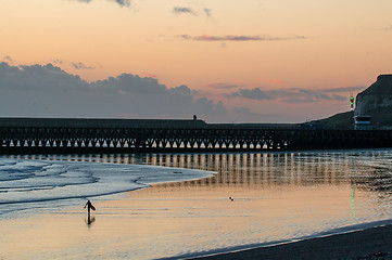 Image showing Surfer Walking on Beach