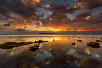 Image showing Rich warm colours of the sunset and reflections Australia