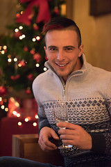 Image showing Happy young man with a glass of champagne