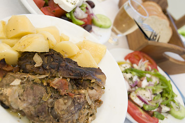 Image showing lamb in the paper greek island taverna food