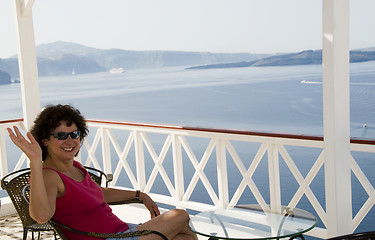 Image showing tourist relaxing in santorini