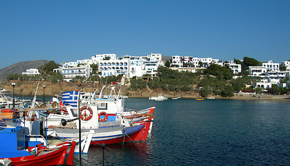 Image showing greek fishing boats in piso livadi harbor with cyclades architec