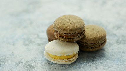 Image showing Delicious macarons pastries on marble