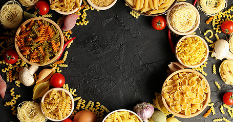 Image showing Arranged bowls with pasta assortment