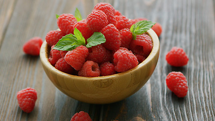 Image showing Fresh raspberry on wooden table 