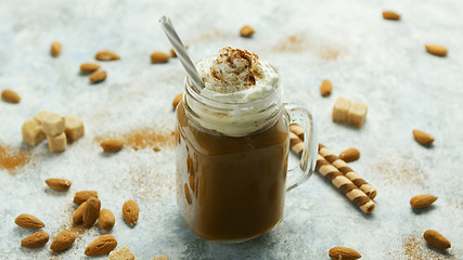 Image showing Cup of cacao with whipped cream and caramel