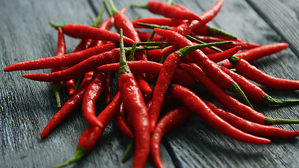 Image showing Pile of bright red chili peppers