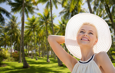 Image showing beautiful woman enjoying summer over palm trees