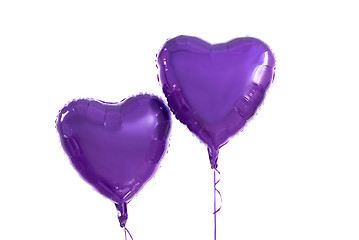 Image showing close up of helium balloons over white background
