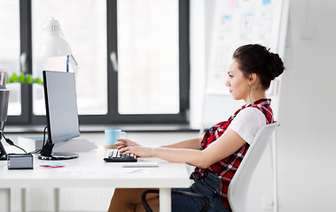 Image showing creative woman with computer working at office
