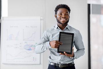 Image showing businessman with tablet pc at office presentation