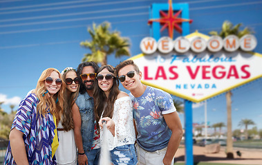 Image showing friends taking selfie by monopod at las vegas sign