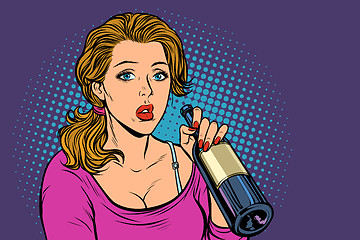 Image showing Woman drinking wine from a bottle. Loneliness and sadness