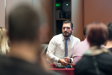 Image showing Speaker Giving a Talk at Business Meeting.