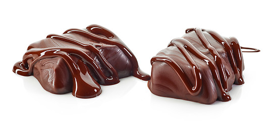 Image showing candies with melted chocolate 