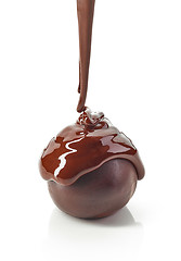 Image showing chocolate truffle covered with melted chocolate