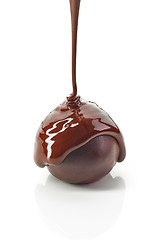 Image showing Chocolate truffle with melted chocolate